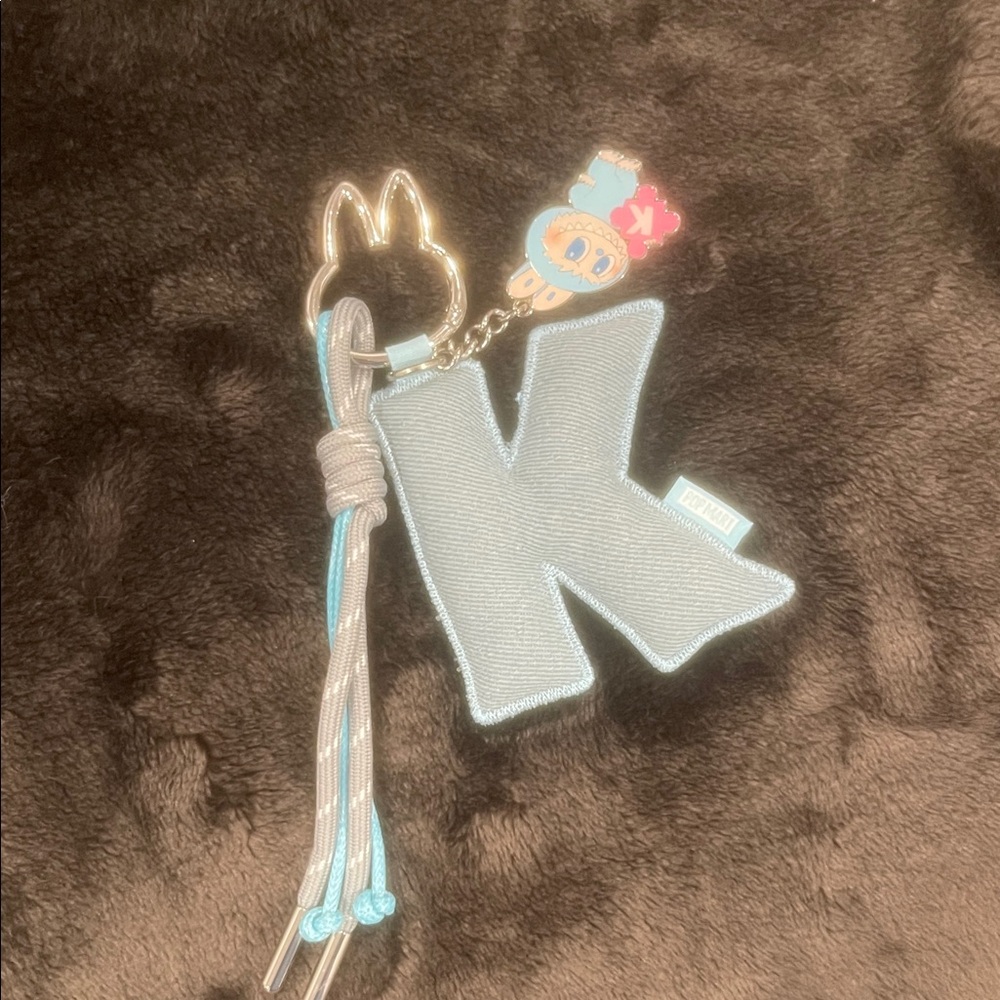 Pin for Love Gray 'K' Keychain with Blue Accents